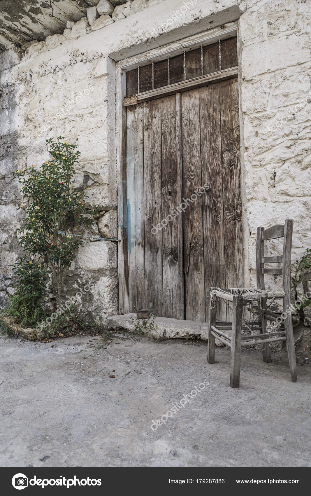 Old Wooden Chair Front Door Street Stock Photo C Bernanamoglu