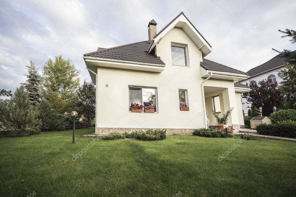 A private house and its garden in a rural area