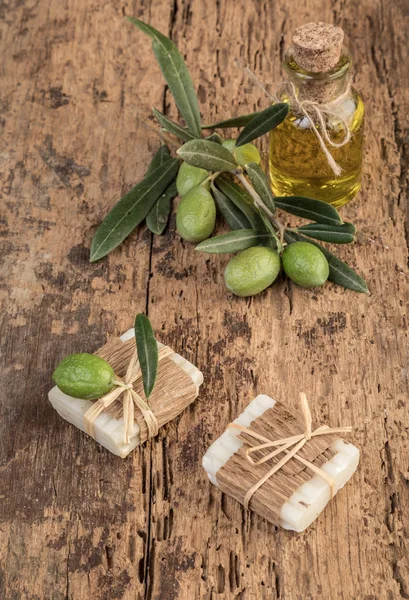 natural olive oil soap bars on wooden table