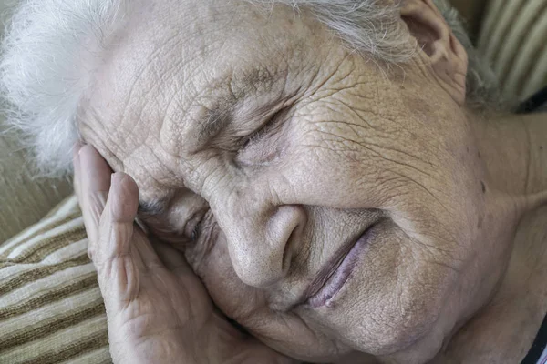 Closeup face of a senior woman sleeping — Stock Photo, Image
