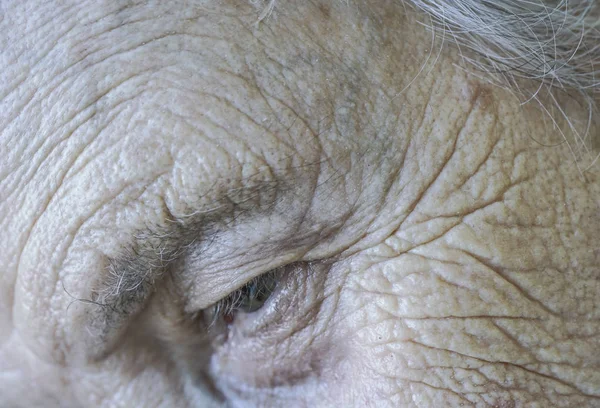 Zbliżenie twarzy starszych kobiety — Zdjęcie stockowe