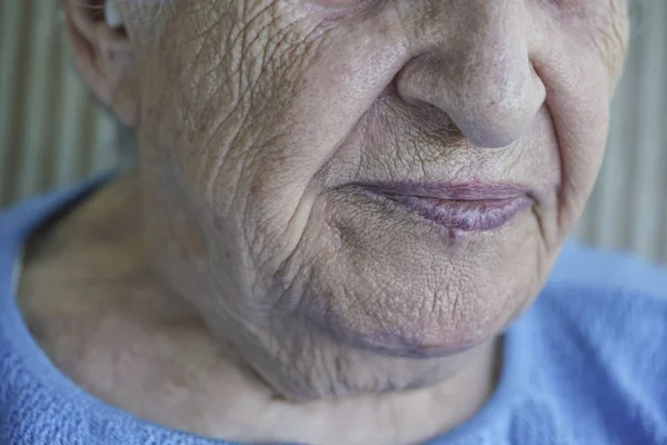 Zbliżenie twarzy starszy osoby — Zdjęcie stockowe