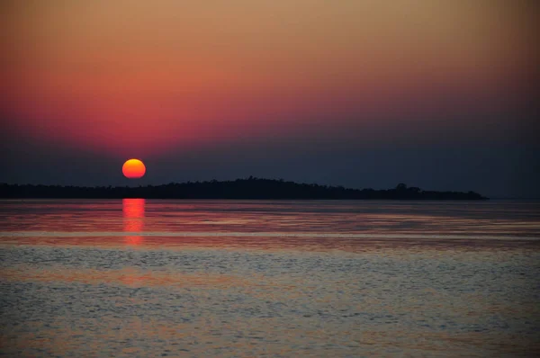 Puesta de sol por mar en verano — Foto de Stock