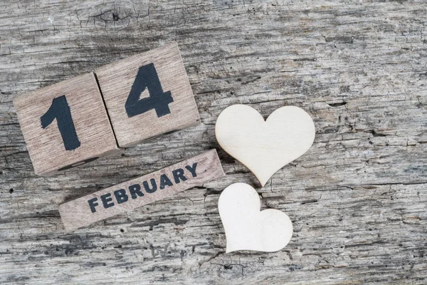 Valentijnsdag begroeting sjabloon op houten achtergrond met Febru — Stockfoto