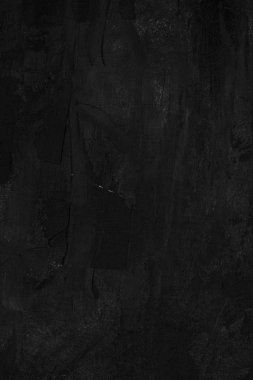 Arkaplan olarak siyah ve gri boyalı duvar