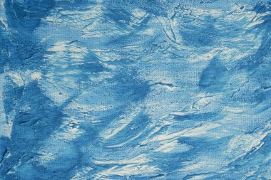 Arkaplan olarak mavi ve beyaz boyalı tuval