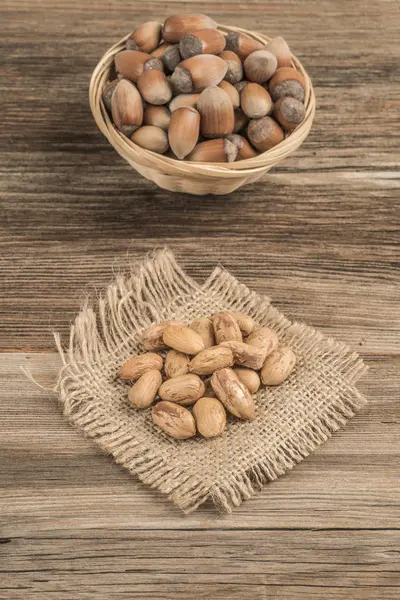 Fresh hazelnuts on a wooden table with copy space — 스톡 사진