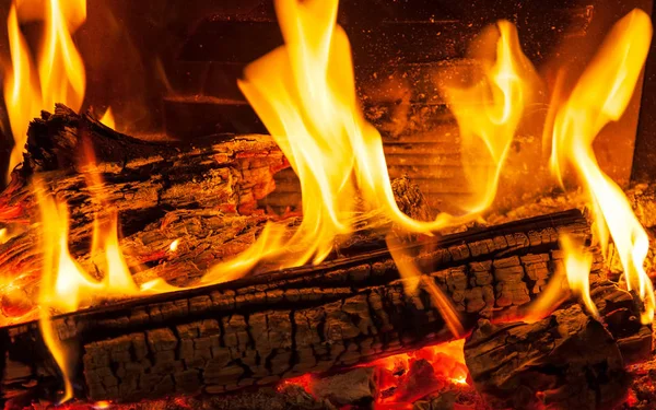 Burning billets in hot stove — Stock Photo, Image