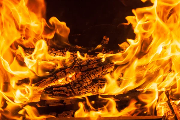 Burning billets in hot stove — Stock Photo, Image