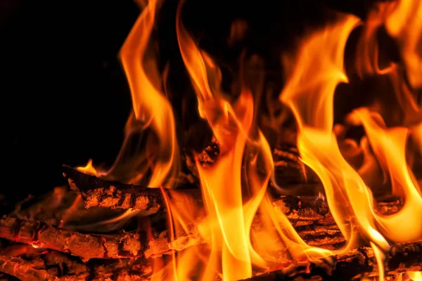 Shot of burning firewood in fireplace — Stock Photo, Image