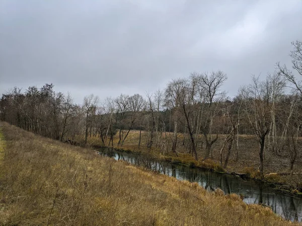 autumn landscape with a river. narrow river.