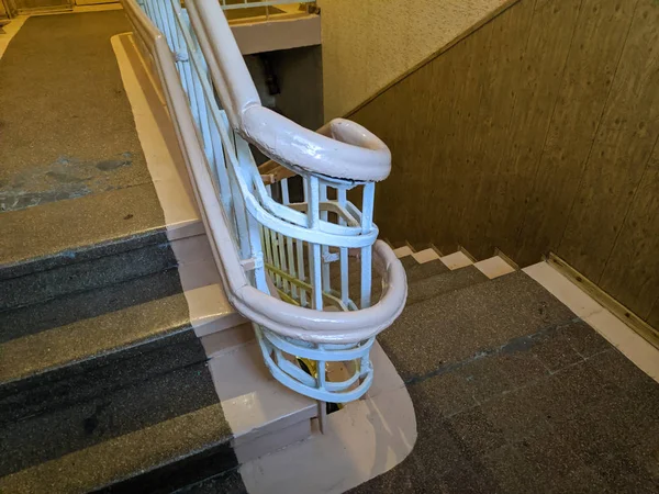 vintage staircase. old railing. old architecture and interior