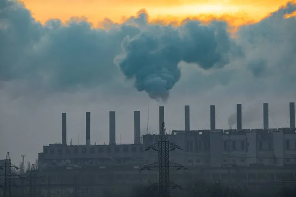 pipes of factories. smoke from factory chimneys.