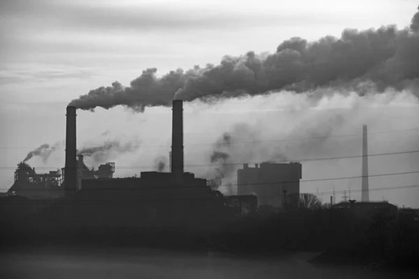 pipes of factories. smoke from factory chimneys.