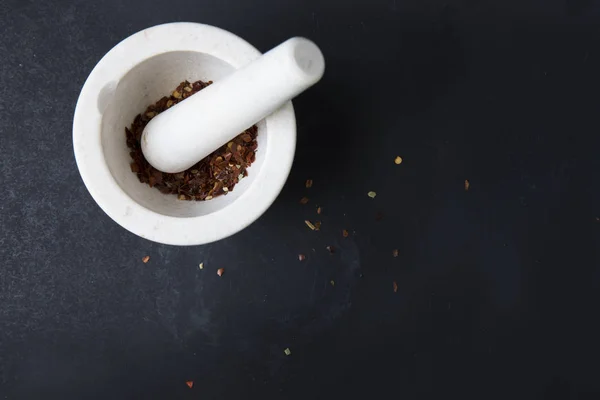 Porcelain Mortar and Pestle with Chili Pepper — Stock Photo, Image