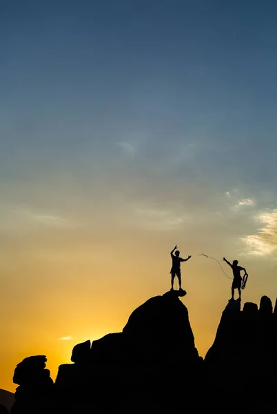 Climbing team on the edge. Royalty Free Stock Photos