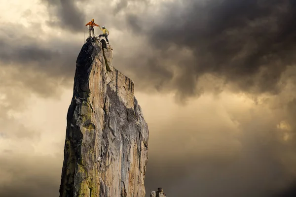 Climbers on the edge. Stock Picture