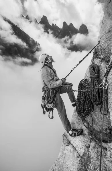 Rock climber on the edge. Royalty Free Stock Images