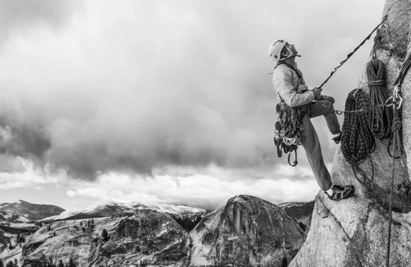 Rock climber on the edge. Stock Image