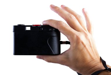 Seyahat kavramı. El ile eski fotoğraf makinesi fotoğraf yapma