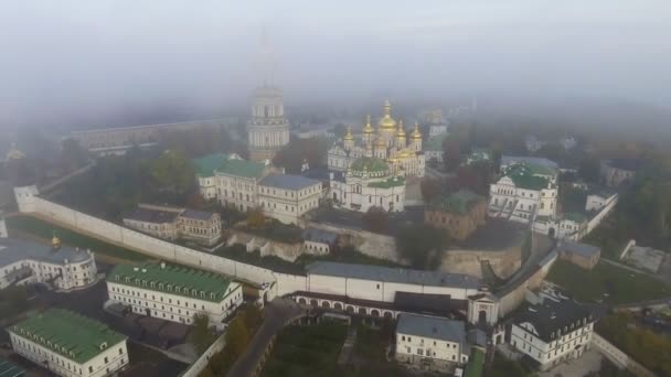 Aerial survey. Museum Kiev Pechersk Lavra. Sunrise over the monastery. The city of Kyiv-Ukraine. City landscape from a birds eye view. — Stock Video