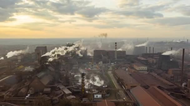 Aerial Hyperlapse Time lapse. Steel factory pipes during sunrise time. — Stock Video