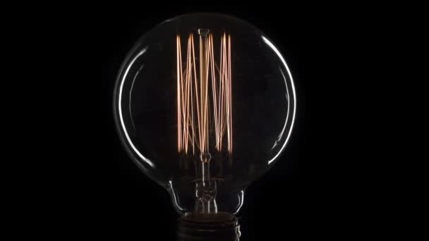 Light bulb Turns On and Off. Close Up. — Stock Video