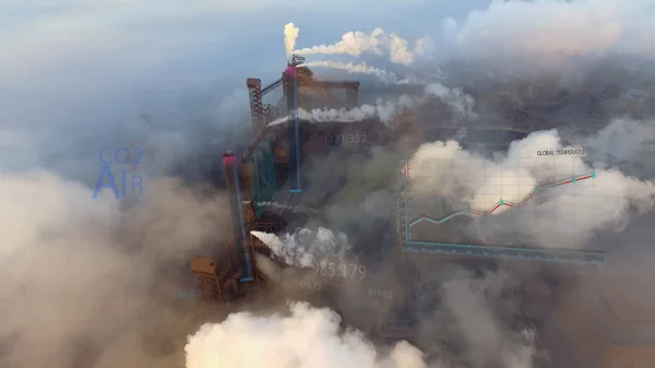 Aérea. Vista de tuberías altas con humo gris con animación por cambio de temperatura Fotos de stock libres de derechos