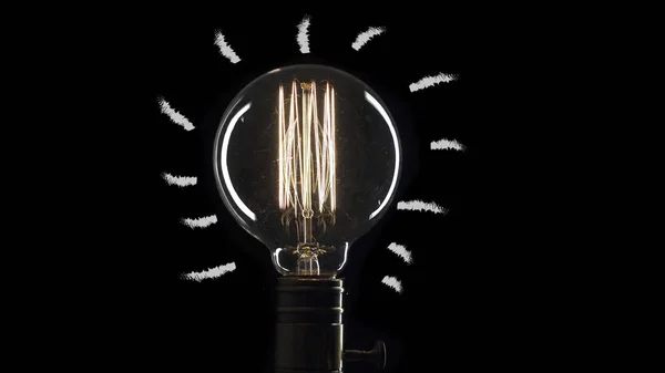 idea light bulb Flickering Tungsten light bulb lamp over black background