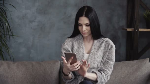 Woman touching smartphone — Stock Video