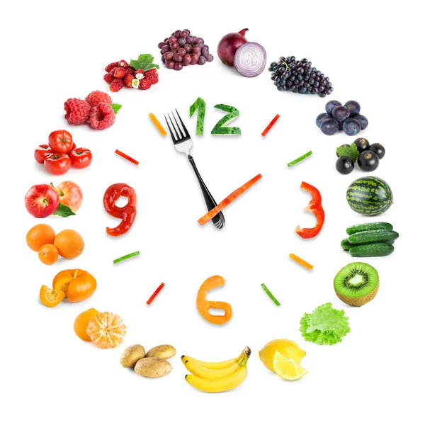 与水果和蔬菜的食物时钟 — 图库照片