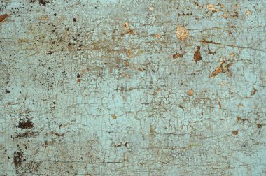 Eski bir ahşap yüzey üzerinde mavi boya kırık