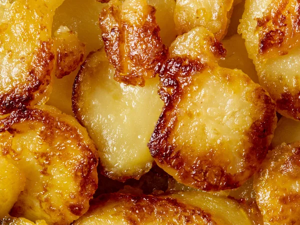 Rustic golden german pan fried potato bratkartofflen food backgr — стоковое фото