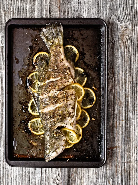 Rustic baked fish — Stock Photo, Image