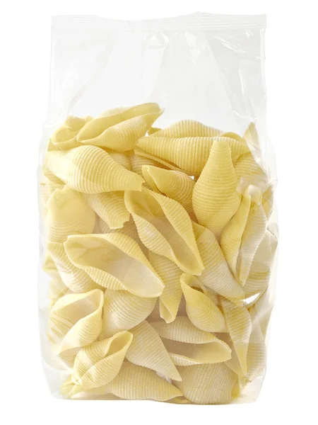 Rohe, ungekochte italienische Conchiglie Jumbo Shell Pasta in Plastiktüte — Stockfoto