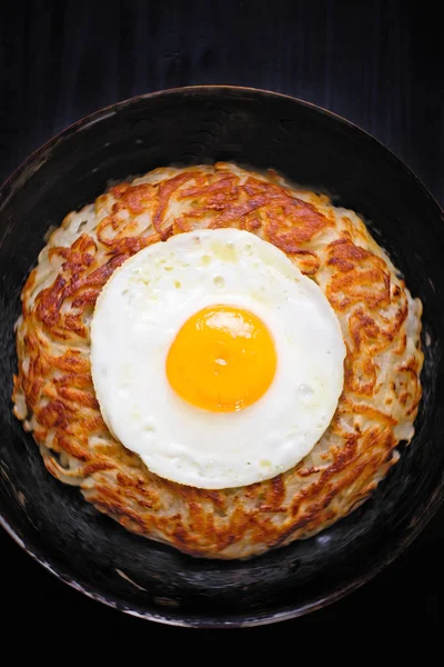 Rustic golden swiss rosti potato — Stock Photo, Image