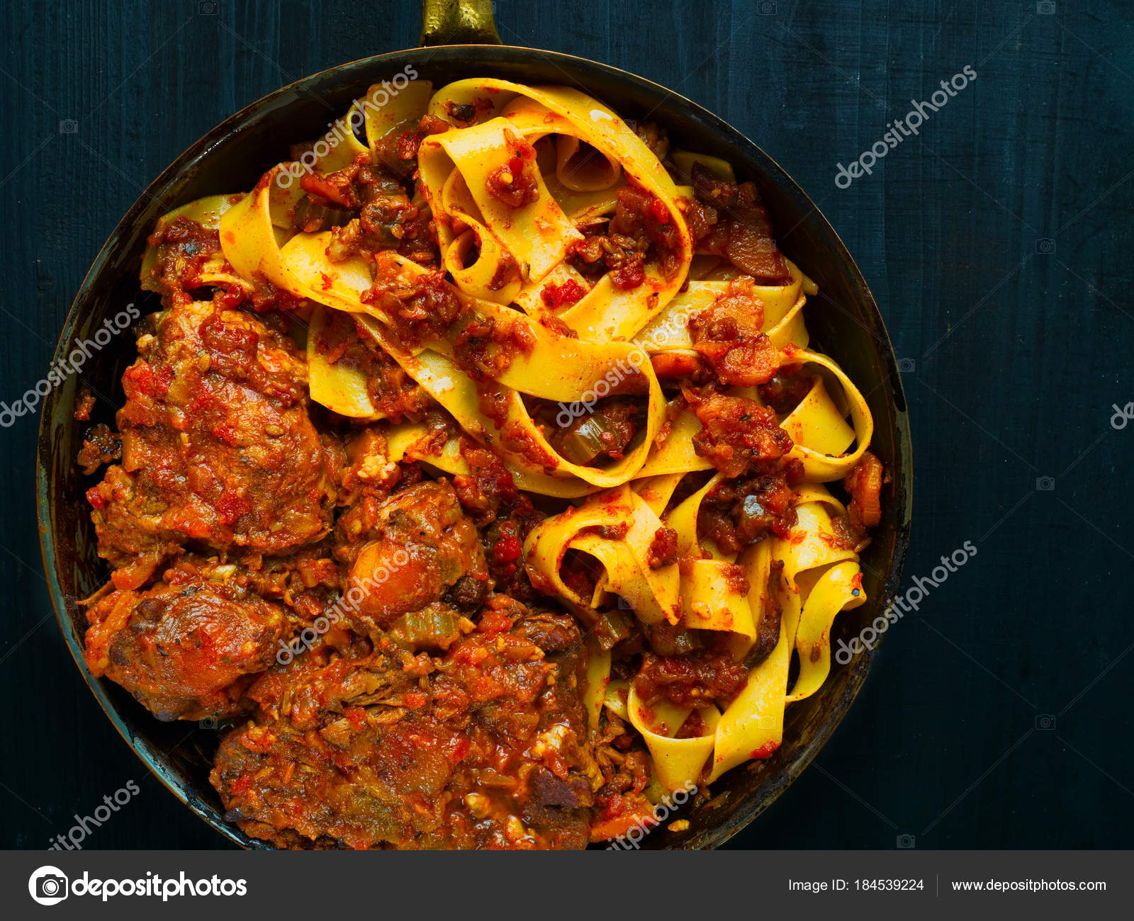 Rustic italian oxtail ragu pappardelle pasta — Stock Photo © zkruger