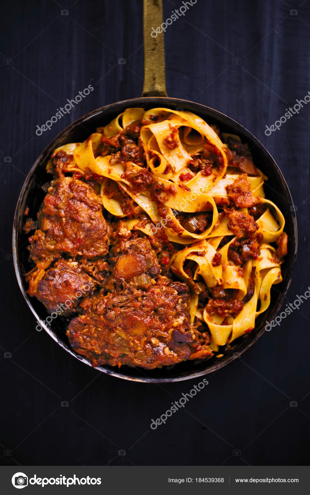 Rustic italian oxtail ragu pappardelle pasta — Stock Photo © zkruger