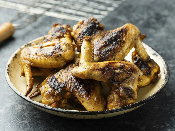 Plate of barbecue chicken wing — Stock Photo, Image