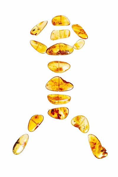 Желтый янтарный камень на белом фоне . — стоковое фото