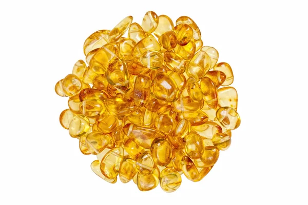 Yellow amber stones on a white background. — Stock Photo, Image