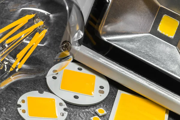 Detail of several LED chips, filament lamp and reflector — Stock Photo, Image