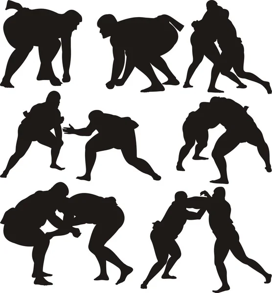 Sumo luchadores siluetas — Vector de stock