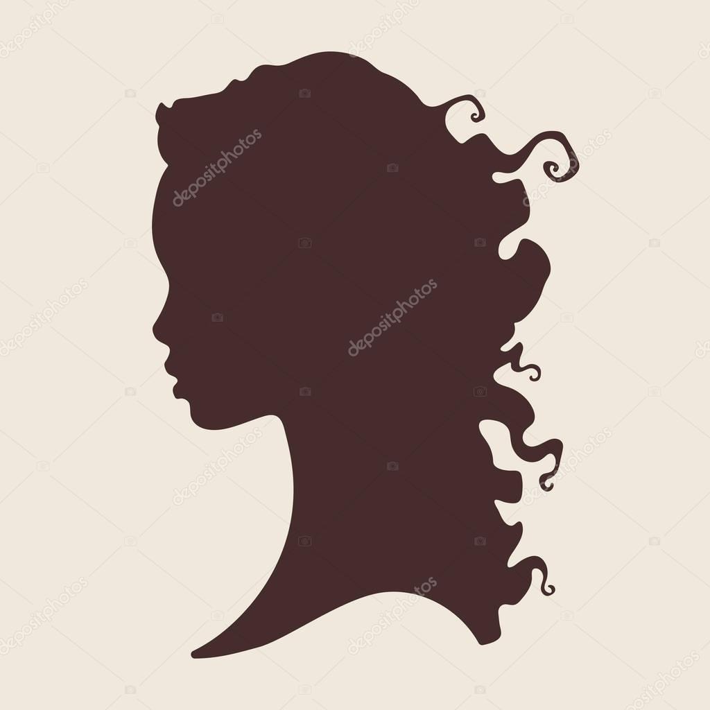 Silhouette of beautiful curly african woman in profile isolated vector illustration. Beauty salon or hair product logo design.