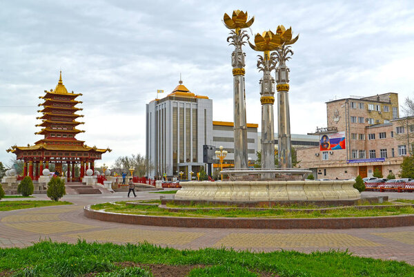 ELISTA, RUSSIA - APRIL 19, 2017: The Sacred Lotus fountain and a pagoda of Seven Days at Lenin Square