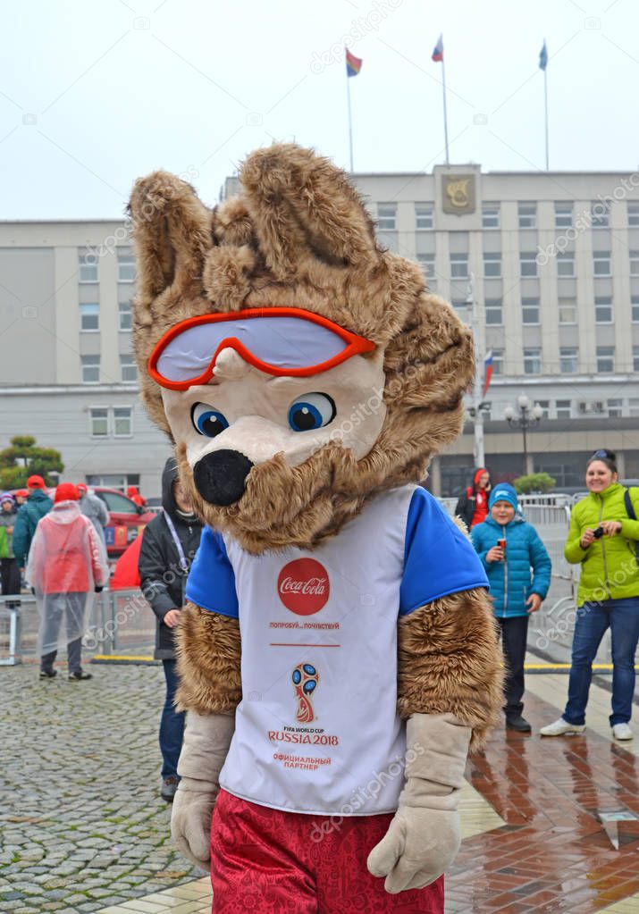 KALININGRAD, RUSSIA - OCTOBER 14, 2017: A mascot of the FIFA World Cup of FIFA 2018 Zabivaka wolf against the background of the City Hall