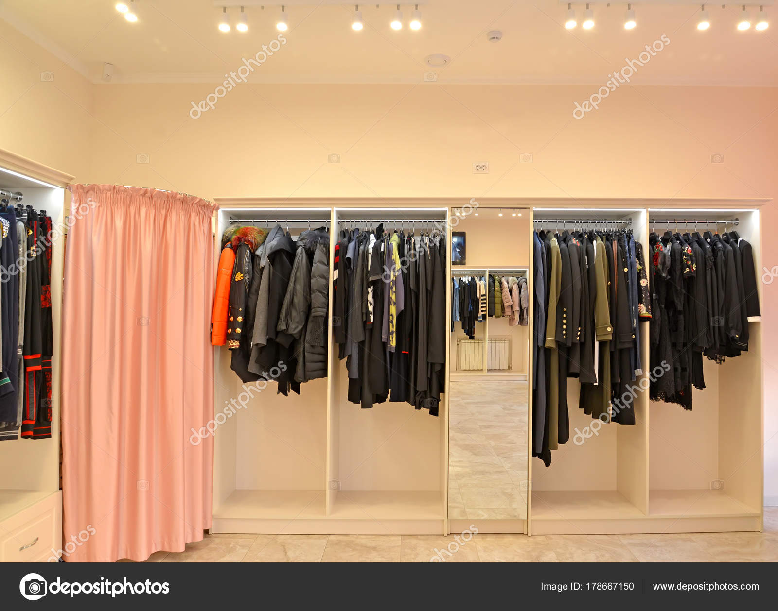 Racks With Clothes And A Fitting Room A Cabin In Shop