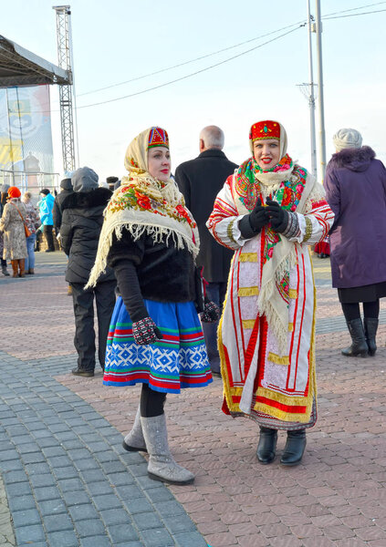 ZELENOGRADSK, RUSSIA - JANUARY 13, 2018: Two women in the Russian national suits on a holiday of winter