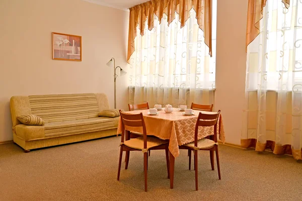 A room interior in warm colors with a picture on a wall — Stock Photo, Image