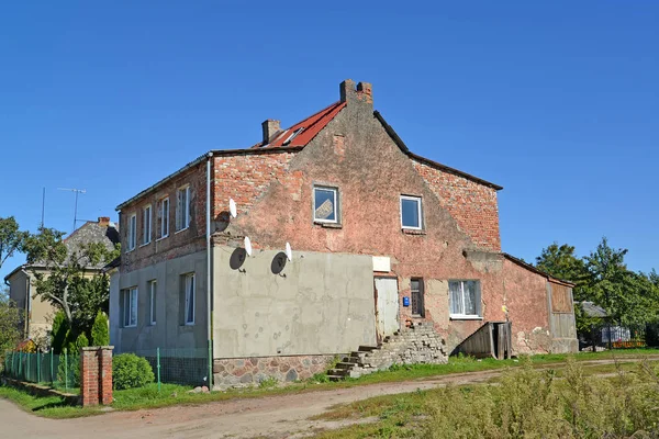 Старый жилой дом довоенного строительства. Знаменск, Калининградская область Лицензионные Стоковые Фото